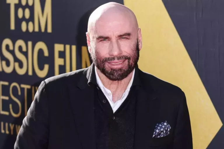 john travolta age and net worth